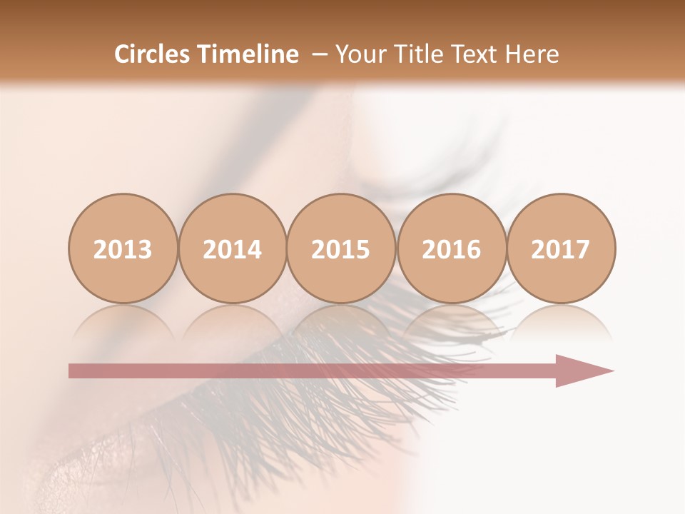 A Close Up Of A Woman's Eye With Long Lashes PowerPoint Template