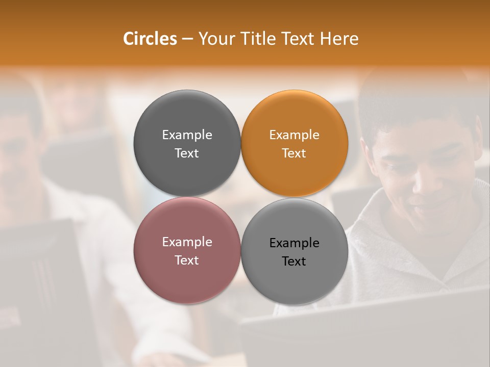 A Group Of People Working On Computers In A Classroom PowerPoint Template