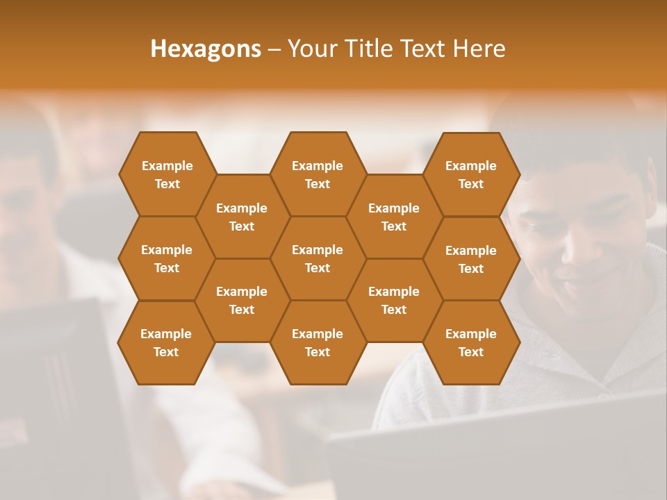 A Group Of People Working On Computers In A Classroom PowerPoint Template