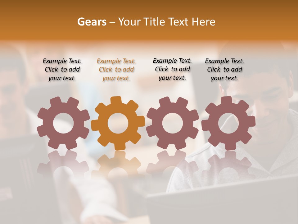 A Group Of People Working On Computers In A Classroom PowerPoint Template