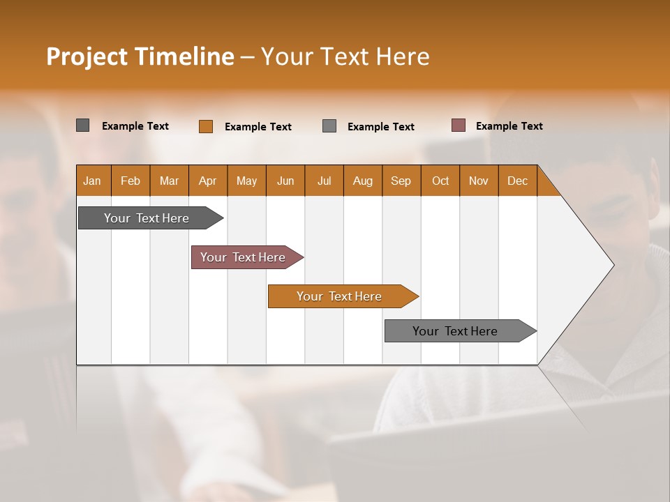 A Group Of People Working On Computers In A Classroom PowerPoint Template