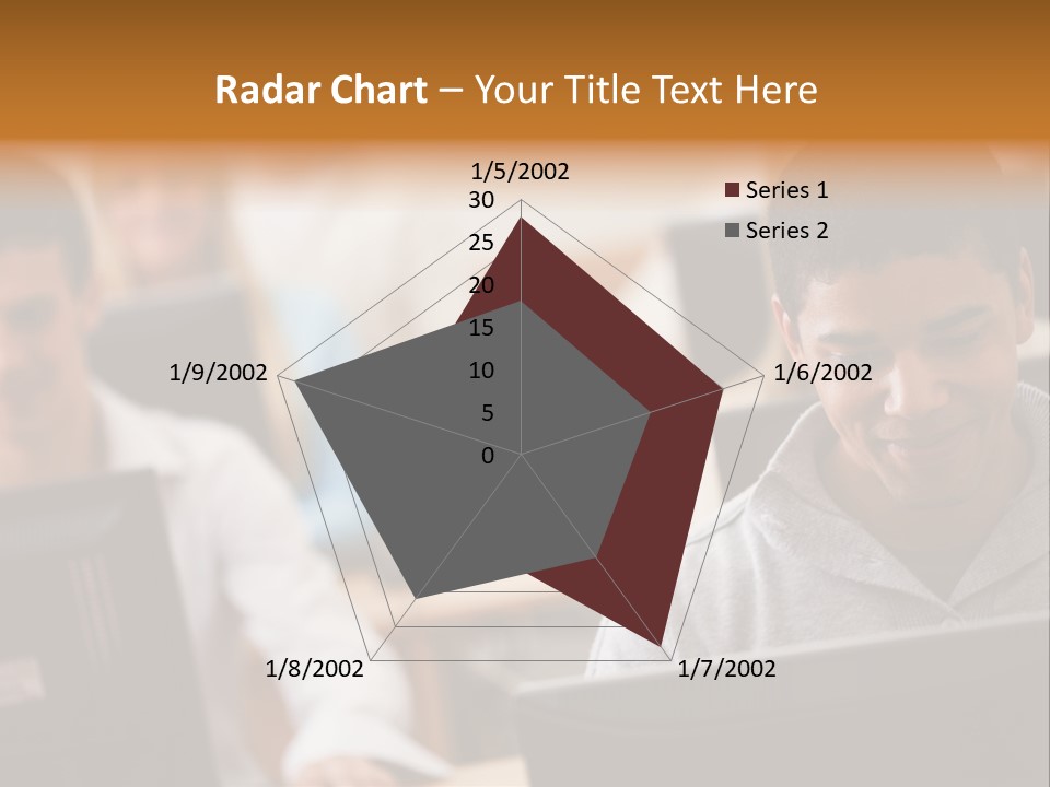 A Group Of People Working On Computers In A Classroom PowerPoint Template