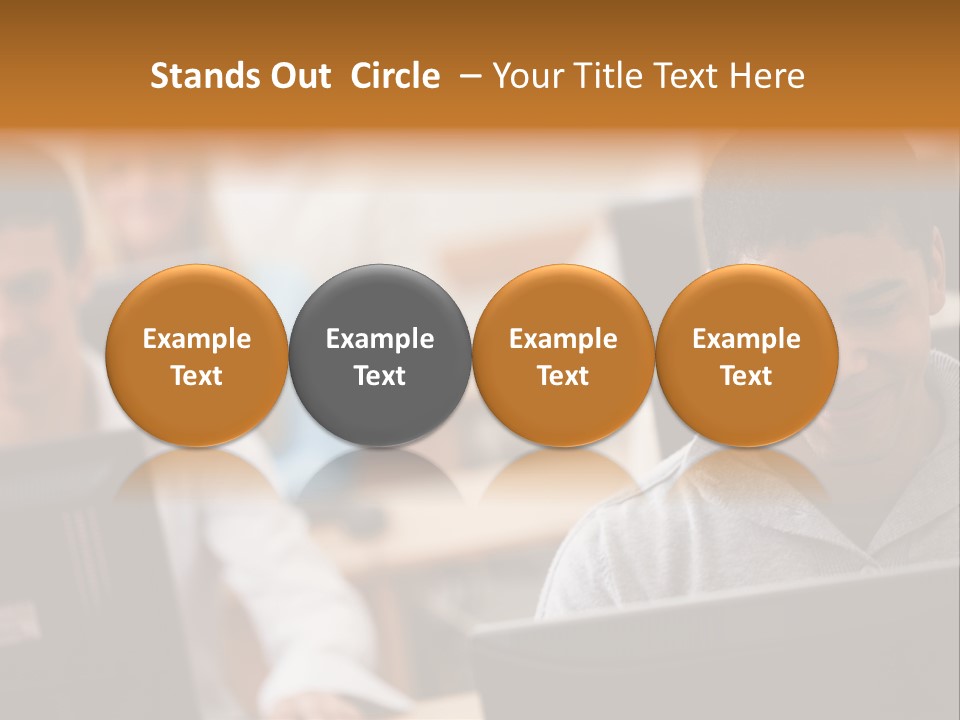 A Group Of People Working On Computers In A Classroom PowerPoint Template