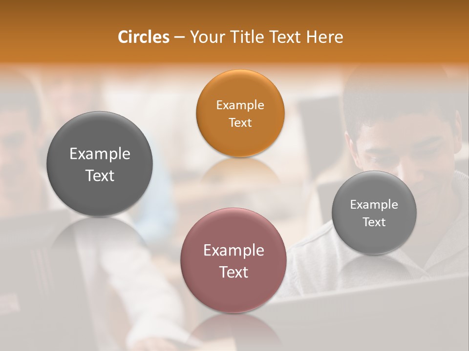 A Group Of People Working On Computers In A Classroom PowerPoint Template