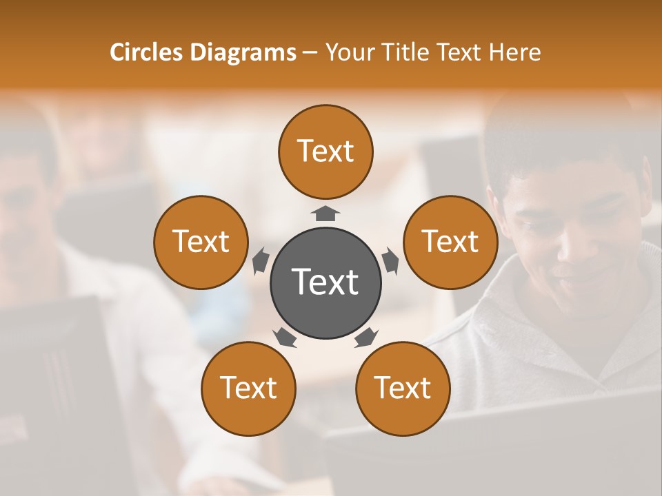 A Group Of People Working On Computers In A Classroom PowerPoint Template