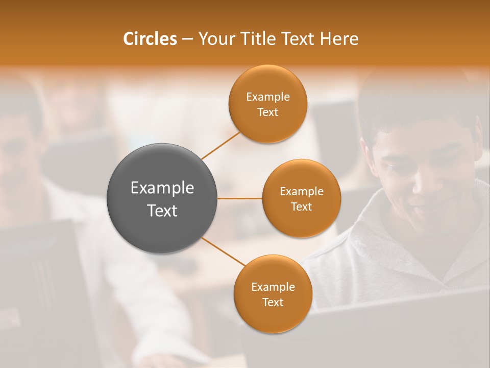 A Group Of People Working On Computers In A Classroom PowerPoint Template