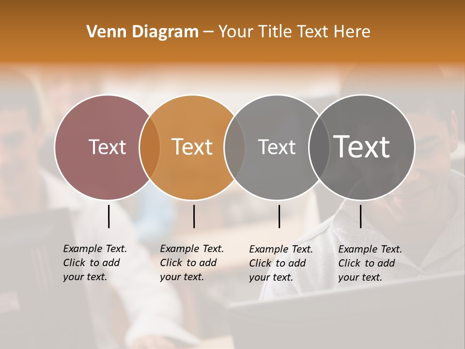 A Group Of People Working On Computers In A Classroom PowerPoint Template