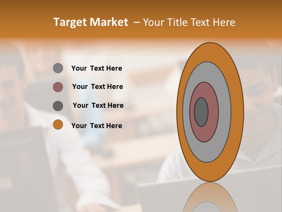 A Group Of People Working On Computers In A Classroom PowerPoint Template