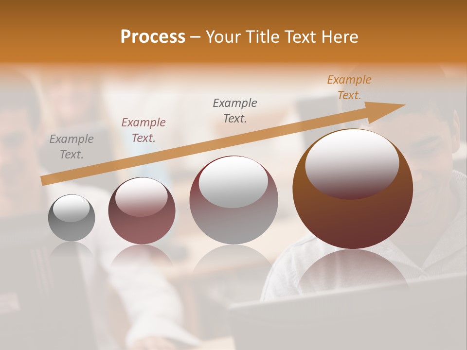 A Group Of People Working On Computers In A Classroom PowerPoint Template