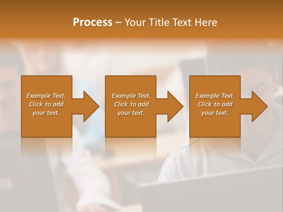 A Group Of People Working On Computers In A Classroom PowerPoint Template