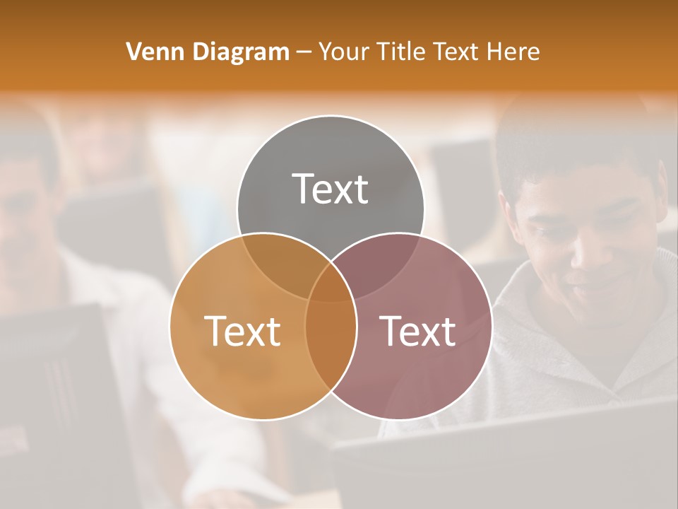 A Group Of People Working On Computers In A Classroom PowerPoint Template