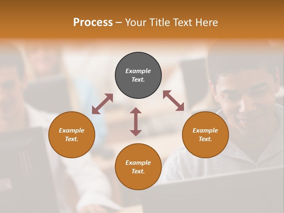A Group Of People Working On Computers In A Classroom PowerPoint Template