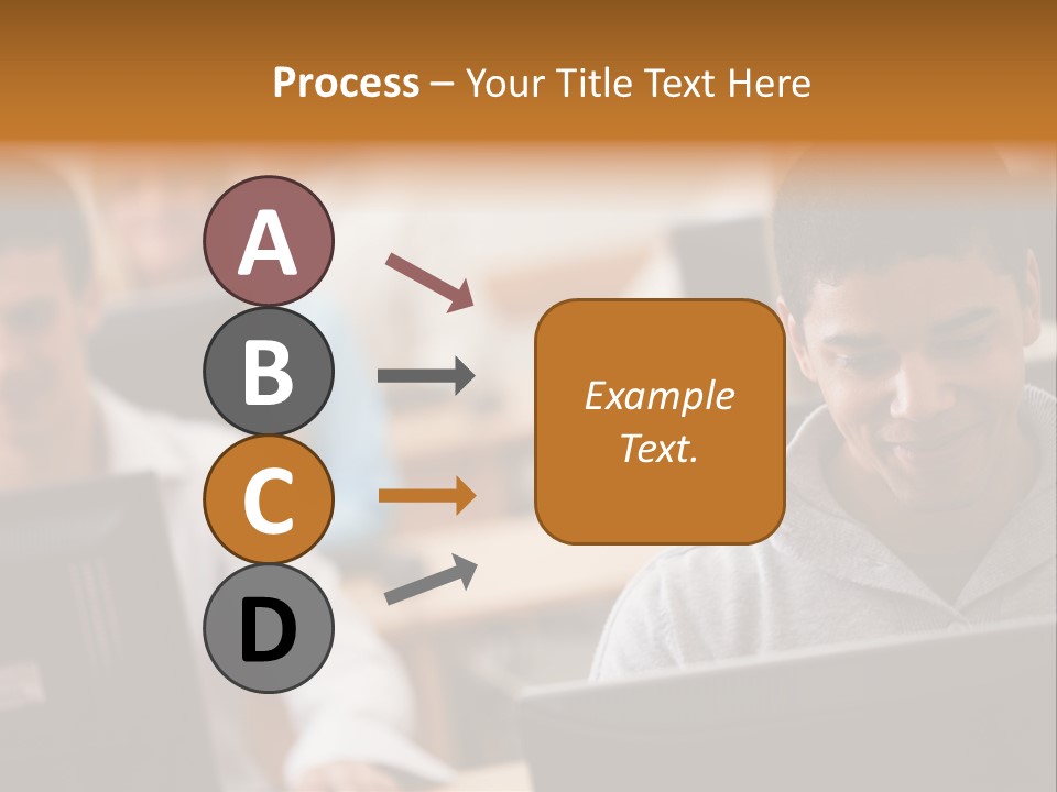A Group Of People Working On Computers In A Classroom PowerPoint Template