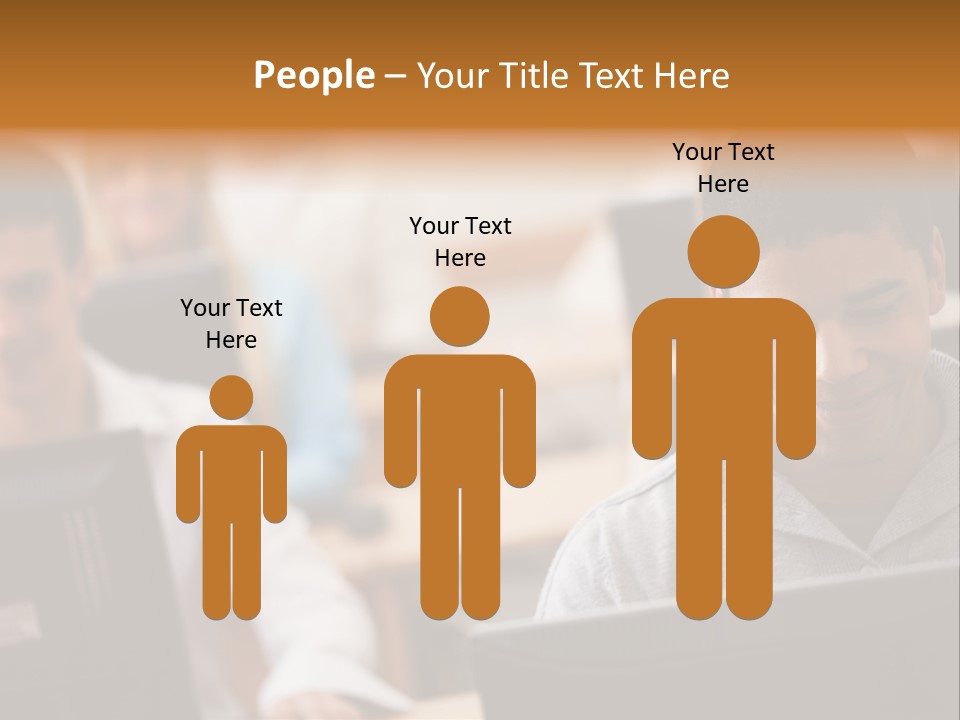 A Group Of People Working On Computers In A Classroom PowerPoint Template