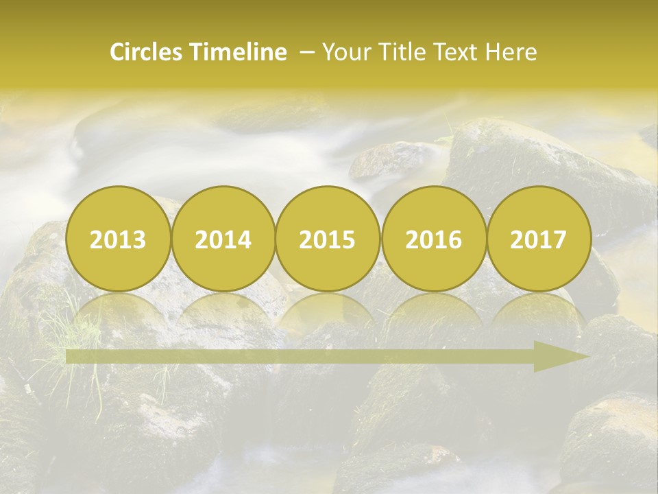 A Stream Of Water Surrounded By Rocks And Grass PowerPoint Template