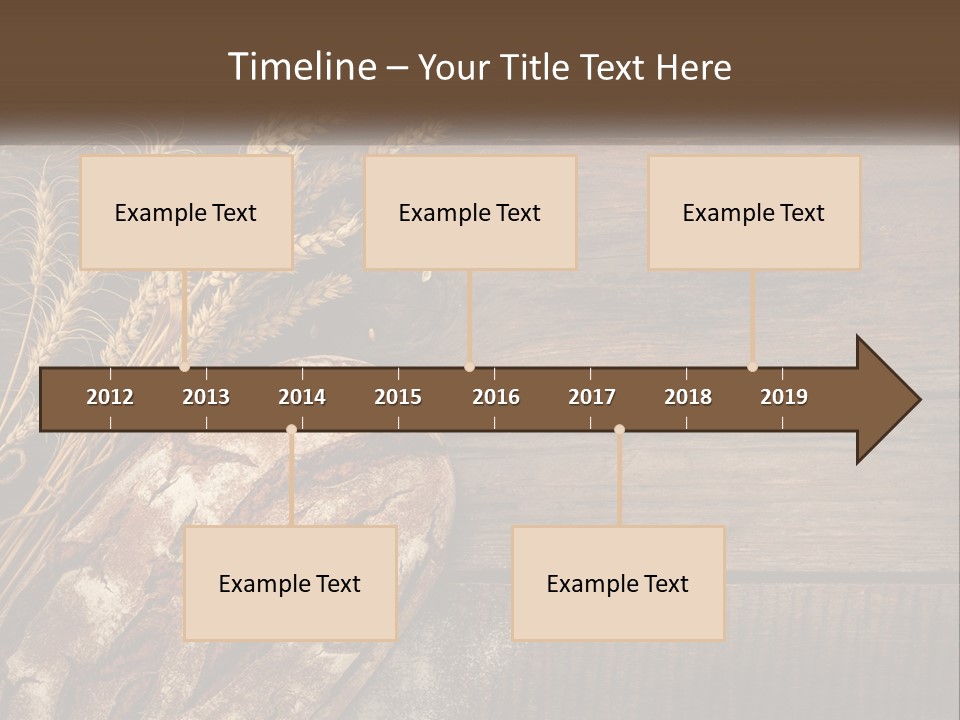 A Loaf Of Bread And Some Wheat On A Wooden Table PowerPoint Template