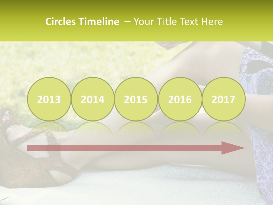 A Woman Is Sitting On The Grass With Her Foot On The Ground PowerPoint Template