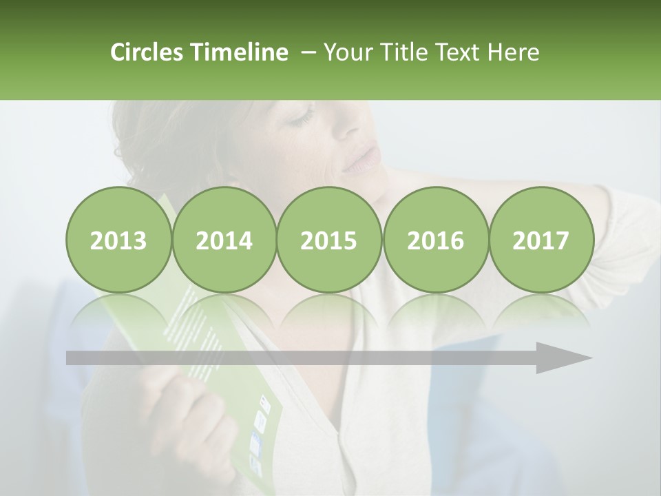 A Woman Holding A Green Folder In Her Hand PowerPoint Template