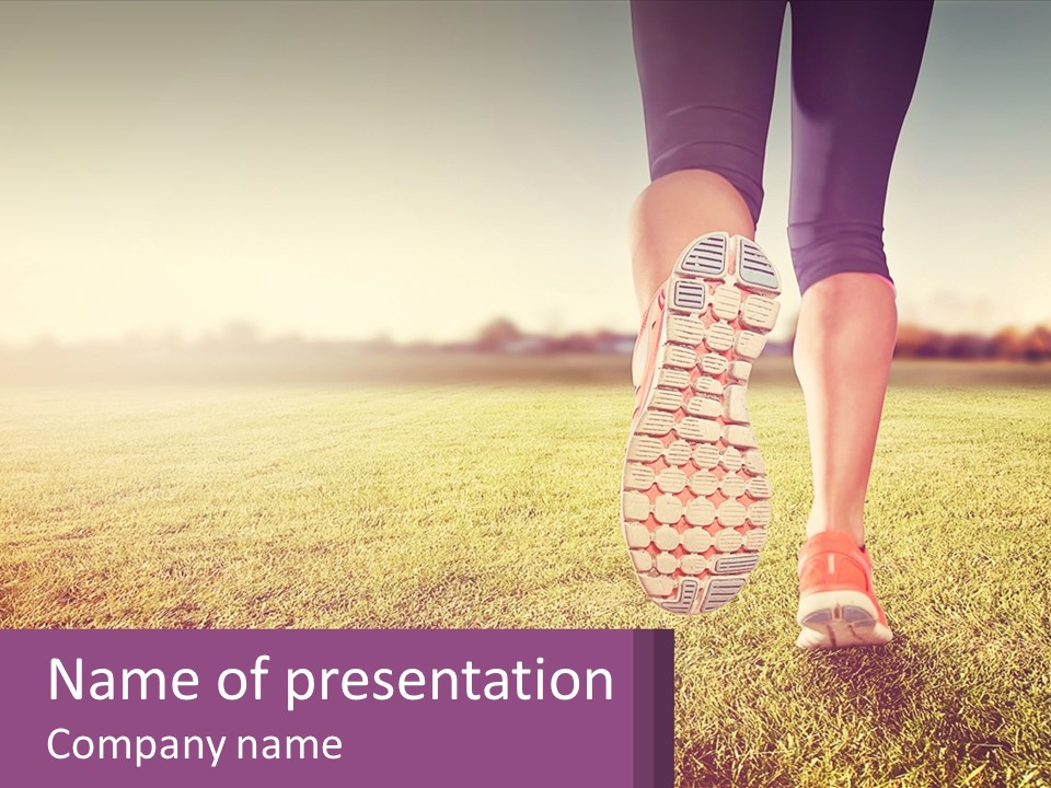 A Person Walking On A Field With A Skateboard PowerPoint Template