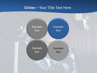 A Man Working On A Car In A Garage PowerPoint Template