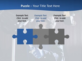 A Man Working On A Car In A Garage PowerPoint Template