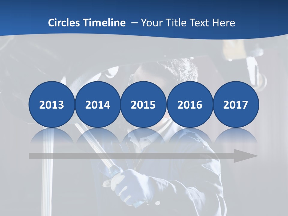 A Man Working On A Car In A Garage PowerPoint Template