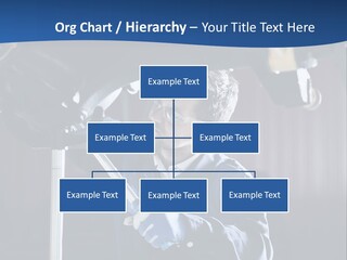 A Man Working On A Car In A Garage PowerPoint Template
