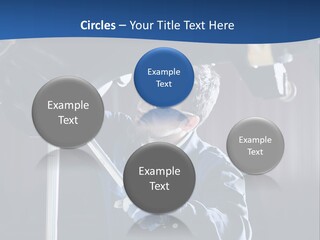 A Man Working On A Car In A Garage PowerPoint Template