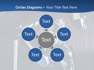 A Man Working On A Car In A Garage PowerPoint Template