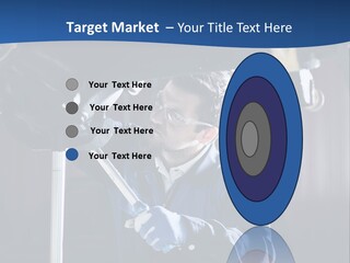 A Man Working On A Car In A Garage PowerPoint Template