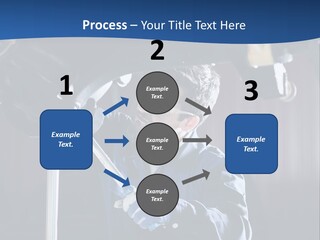 A Man Working On A Car In A Garage PowerPoint Template