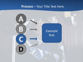 A Man Working On A Car In A Garage PowerPoint Template