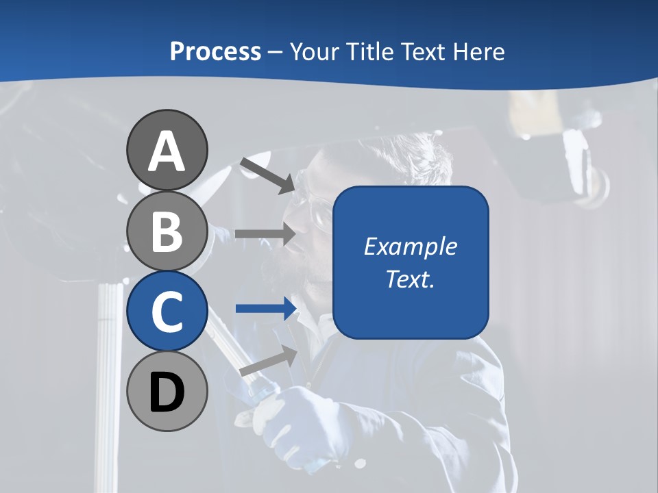 A Man Working On A Car In A Garage PowerPoint Template