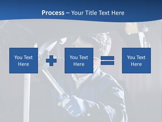A Man Working On A Car In A Garage PowerPoint Template