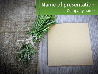 A Piece Of Paper With A Sprig Of Rosemary On Top Of It PowerPoint Template