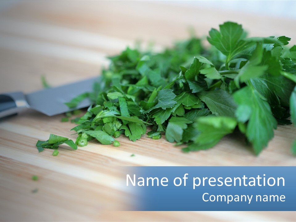A Bunch Of Green Leaves On A Cutting Board With A Knife PowerPoint Template