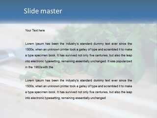 A Bunch Of Green Leaves On A Cutting Board With A Knife PowerPoint Template