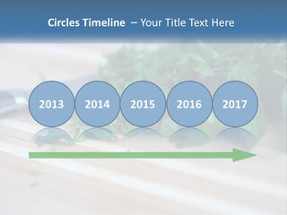 A Bunch Of Green Leaves On A Cutting Board With A Knife PowerPoint Template