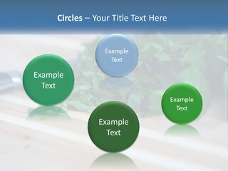 A Bunch Of Green Leaves On A Cutting Board With A Knife PowerPoint Template