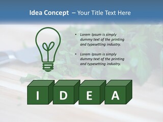 A Bunch Of Green Leaves On A Cutting Board With A Knife PowerPoint Template
