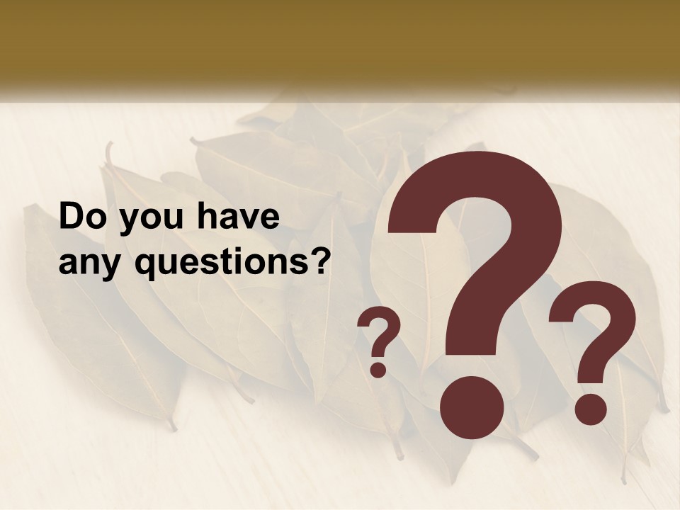 A Pile Of Leaves Sitting On Top Of A Wooden Table PowerPoint Template