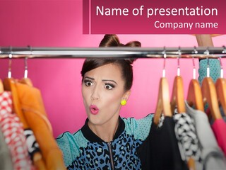 A Woman Standing In Front Of A Rack Of Clothes PowerPoint Template