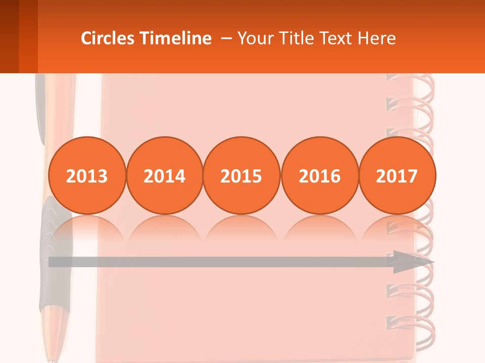 An Orange Notebook With A Pen On Top Of It PowerPoint Template