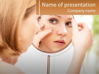 A Woman Looking At Her Face In A Mirror PowerPoint Template