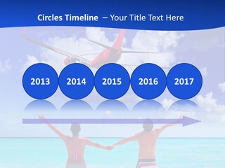 Two People Standing In The Water With A Plane In The Background PowerPoint Template