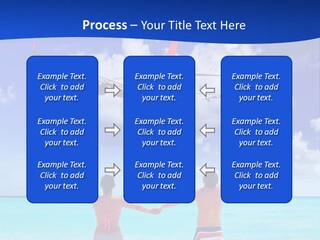 Two People Standing In The Water With A Plane In The Background PowerPoint Template