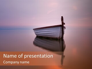 A Boat Is Sitting In The Water On A Calm Day PowerPoint Template