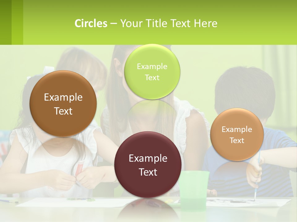 A Woman Sitting At A Table With Two Children PowerPoint Template