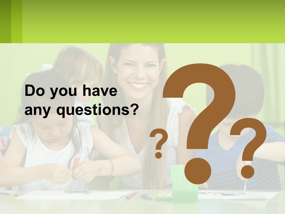 A Woman Sitting At A Table With Two Children PowerPoint Template