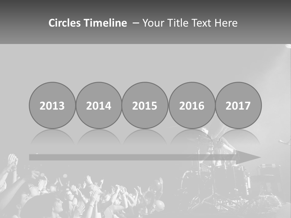 A Man On Top Of A Drum Set In Front Of A Crowd PowerPoint Template